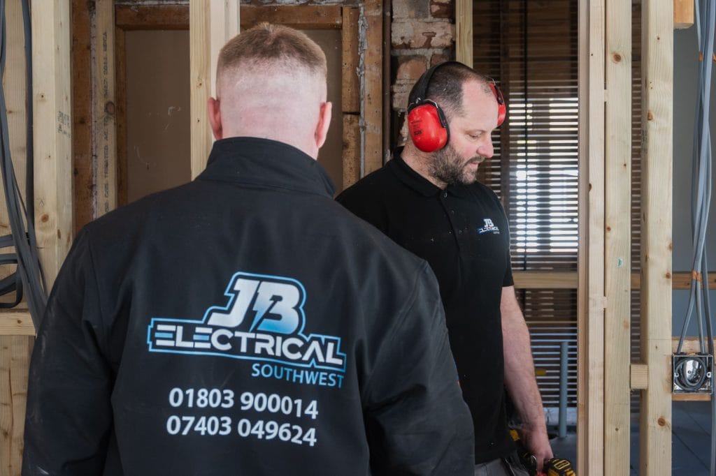 action shot of jb electrical team content shoot devon